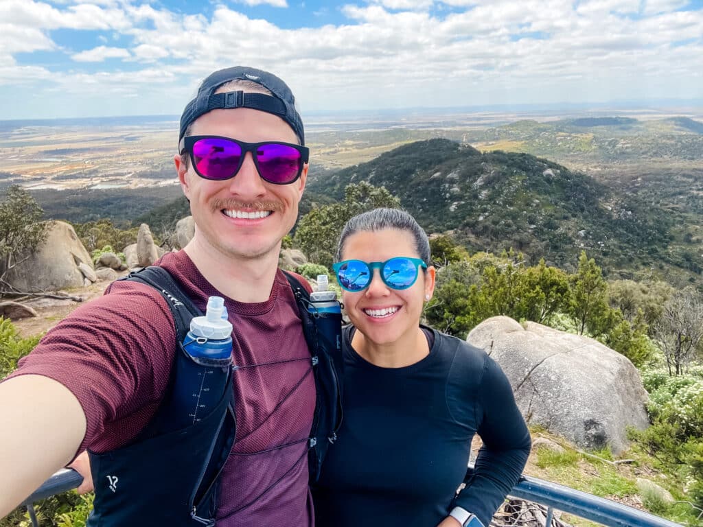 Andrea Bombino of Made to Mother Co poses with her husband as they trained for a marathon, before she became a motherhood & career coach.